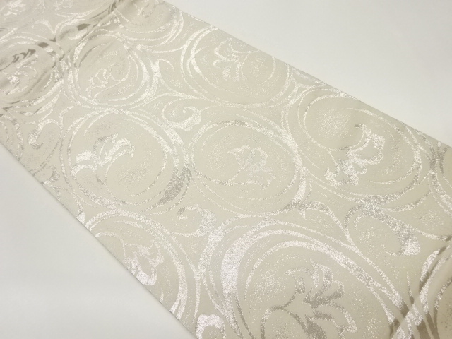 丸文に草花模様織出し丸帯